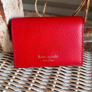 Kate Spade New York red pebbled leather accordion wallet